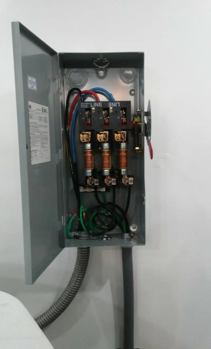 Three-phase disconnect switch installed for Smoke Detector Installation in Grinnell